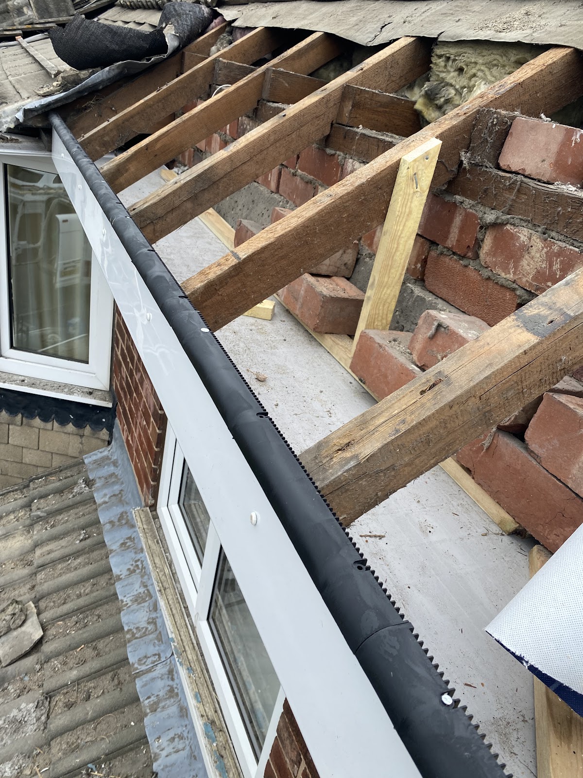 Dormer roof rebuild with new fascia and rafters